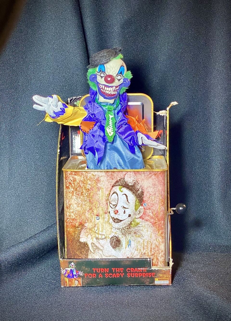 This is an Atico 2009 Scary Clown Jack in the Box with lights and sounds
